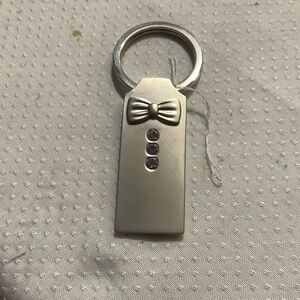 Sophisticated Silver Keychain with Bow Tie Accent